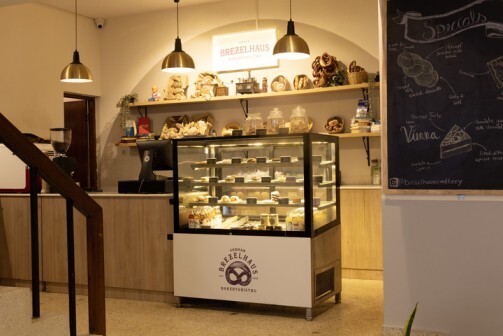 Interior counter area showcasing freshly baked German bread and pastries